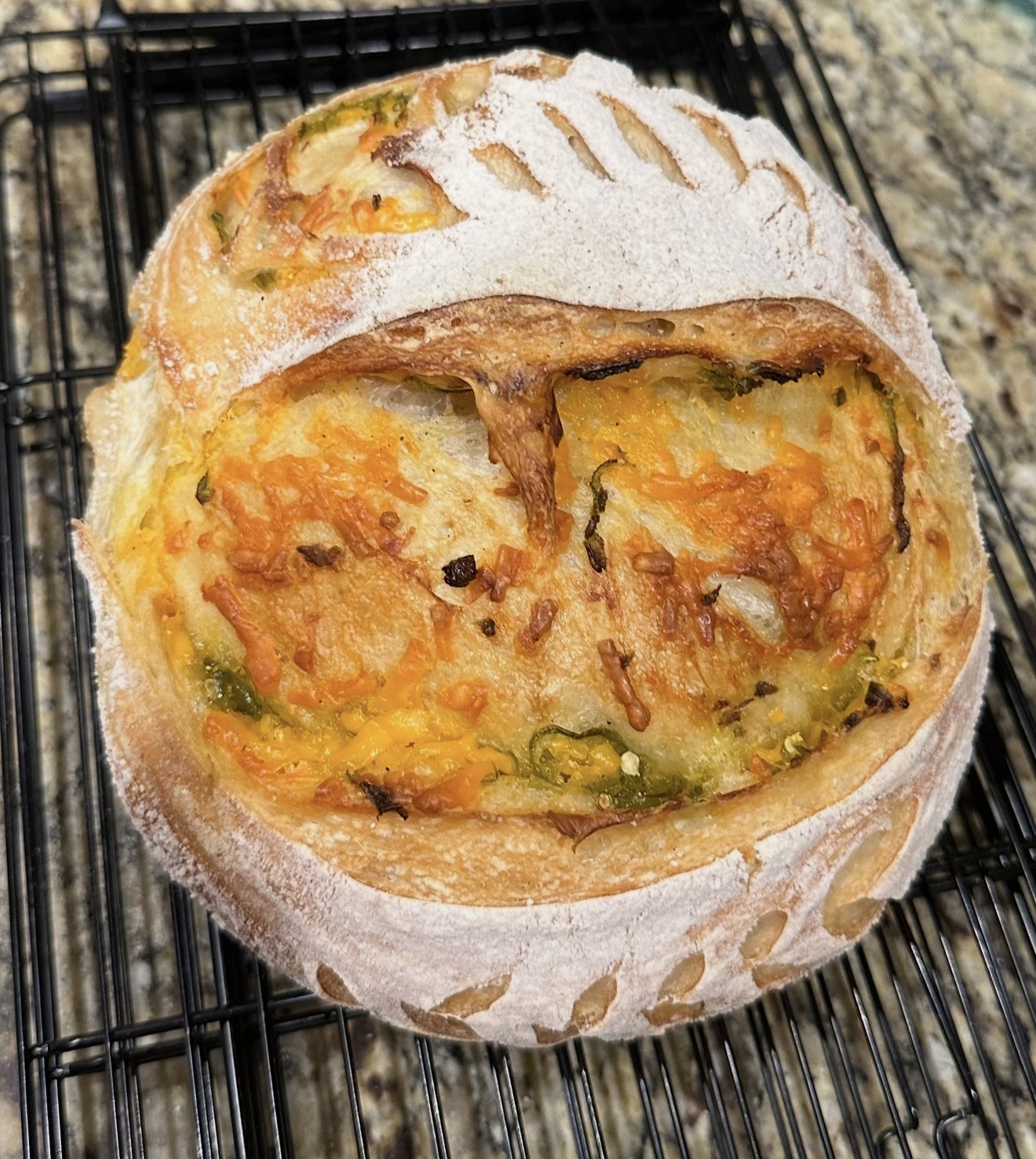 Fresh artisan sourdough loaf by Peaked Perfection